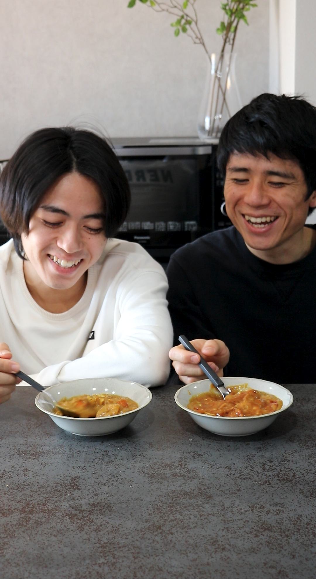 Ryota and Shunta discussing Japanese Curry recipe with Dashi and secret ingredient apple.